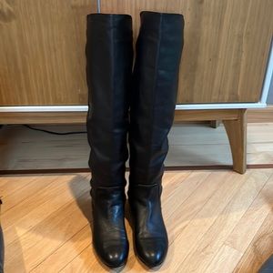 Over the knee black leather boots